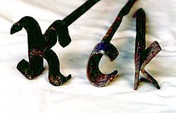 250px-Branding_irons-Dutch_K,_c,_and_k