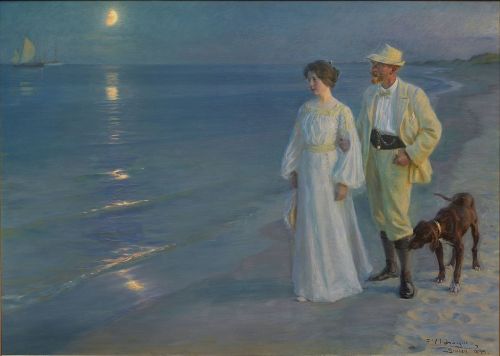 P.S. Krøyer, Summer Evening at Skagen Beach – The Artist and his Wife (1899) Via Wikimedia Commons